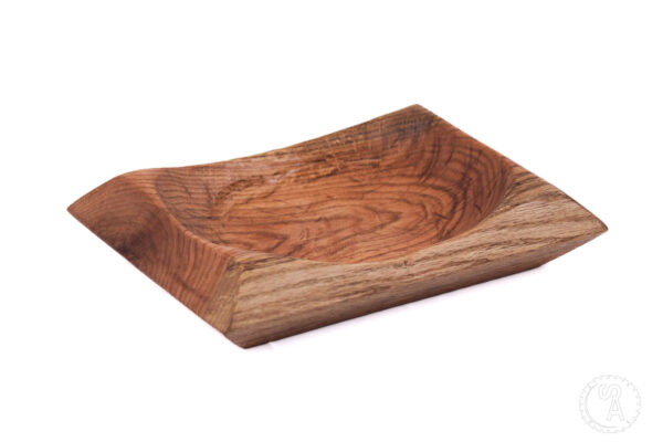 Side angle of shallow oak bowl in the shape of a square